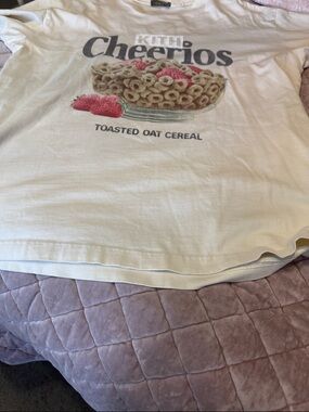 Kith Cream Graphic Tee with Cheerios and Red Strawberry Print